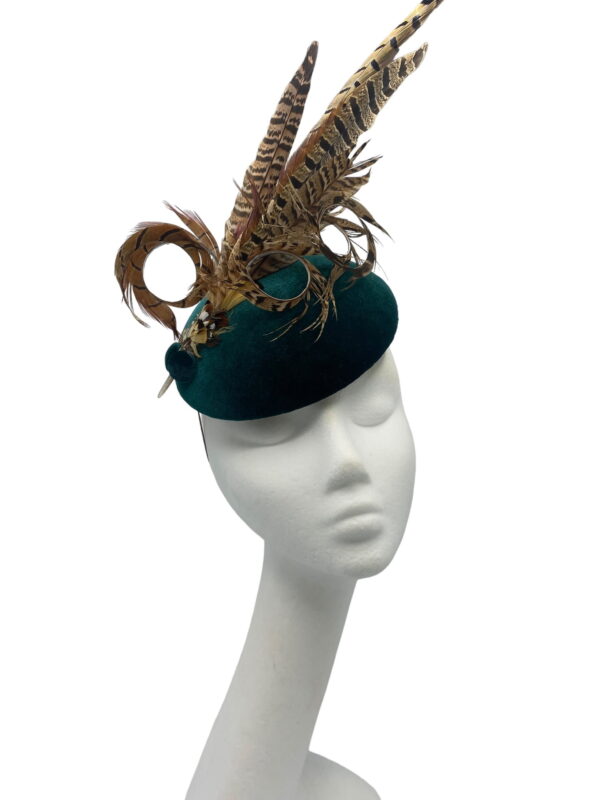 Green velvet feathered headpiece.